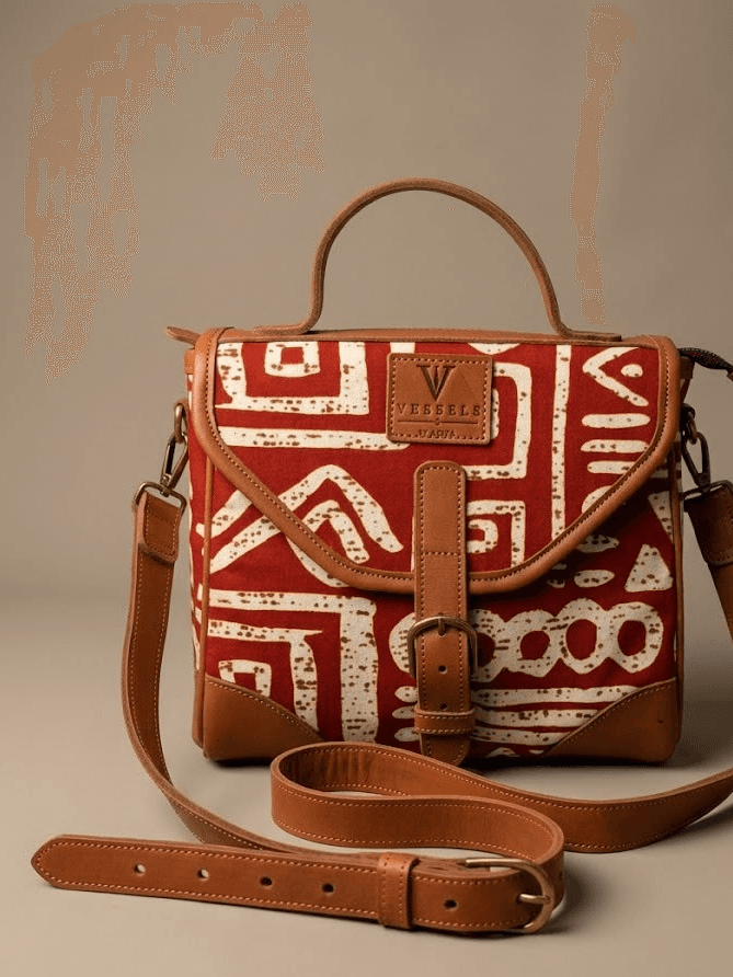 Azi Crossbody compact textile bag with strap on cream background
